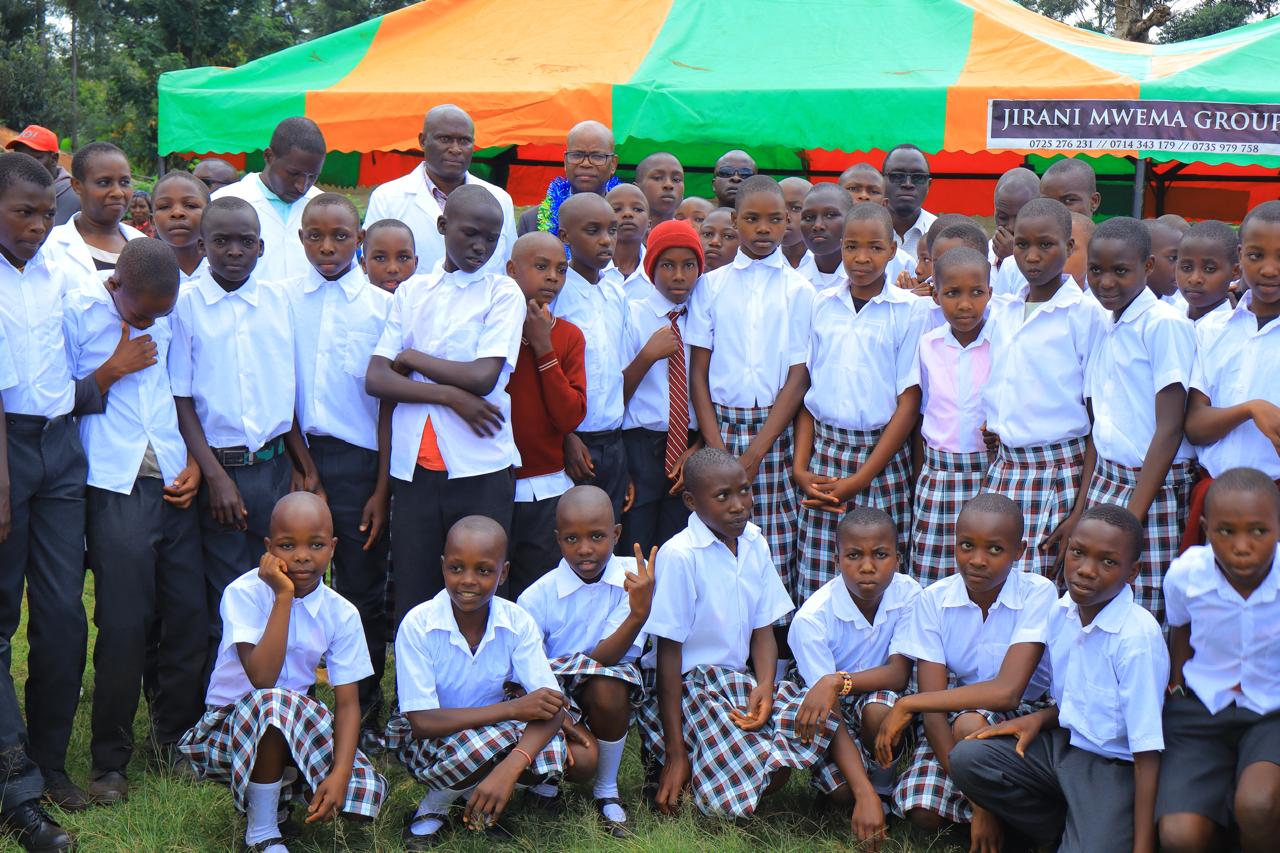 Children receiving uniforms